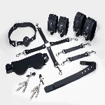 Набір Feral Feelings BDSM Kit 7 Black, наручники, поножі, конектор, маска, падл, кляп, затискачі - мініатюра 1
