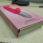 Мінівібратор-кролик зі стимулювальною стрічкою Fun Factory AMORINO pink/neon yellow (м'яте паковання!!!) - мініатюра 2