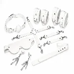 Набір Feral Feelings BDSM Kit 7 White, наручники, поножі, конектор, маска, падл, кляп, затискачі - мініатюра 1